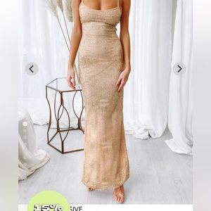 Brand new, unworn gold dress. Beginning Boutique